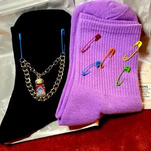 Three pairs of cute Dolls Kill socks. One size.